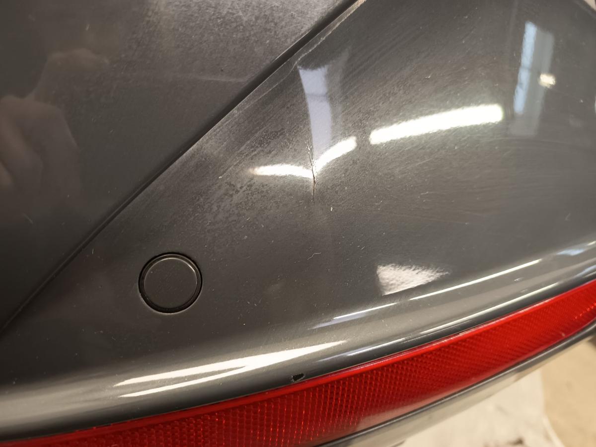 Seat Leon 1P Facelift Bj 2009 original Sto&szlig;f&auml;nger hinten mit PDC LZ7X Nimbusgrau