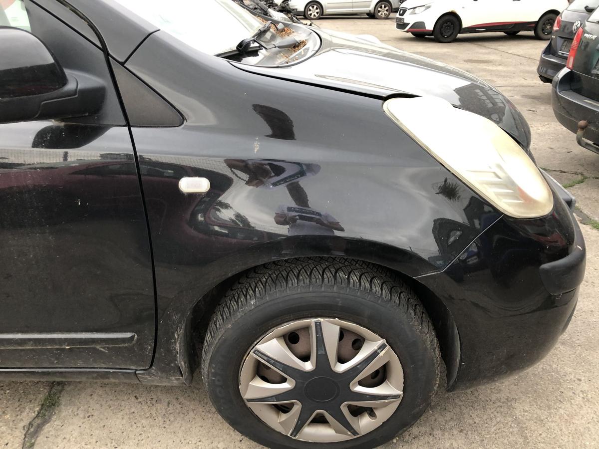 Nissan Note E11 Kotfl&uuml;gel vorn rechts Befahrerseite schwarz Delle