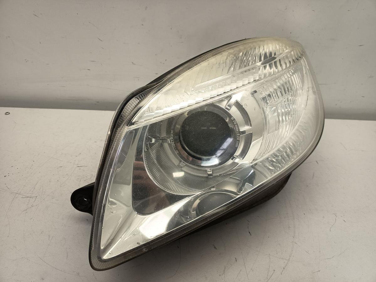 Skoda Fabia 5J original Scheinwerfer links Linse Halogen Baujahr 2009