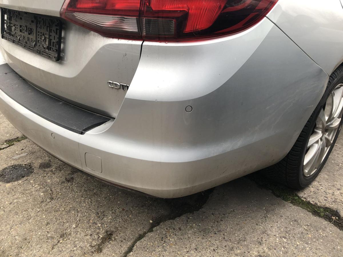 Opel Astra K B16 Caravan Stoßfänger hinten Heckschürze mit PDC Z176 Argonsilber