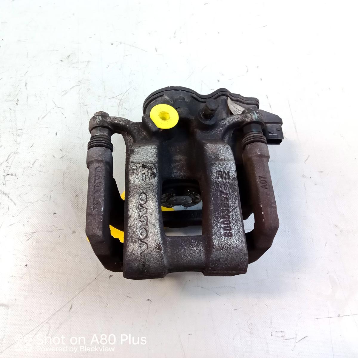 Volvo EX30 original Bremssattel Hinterachse rechts mit Tr&auml;ger Bj.2024