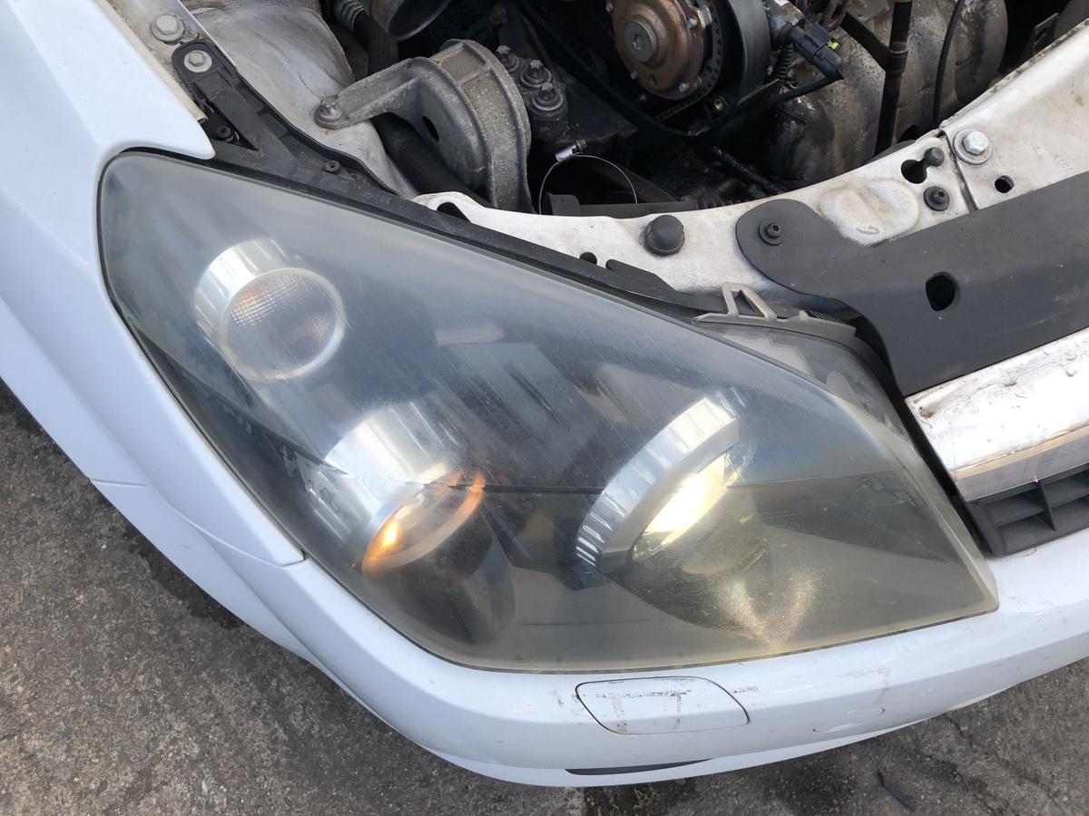 Opel Astra H GTC Scheinwerfer rechts Xenonscheinwerfer Tr&uuml;b OEM Hella Lampe