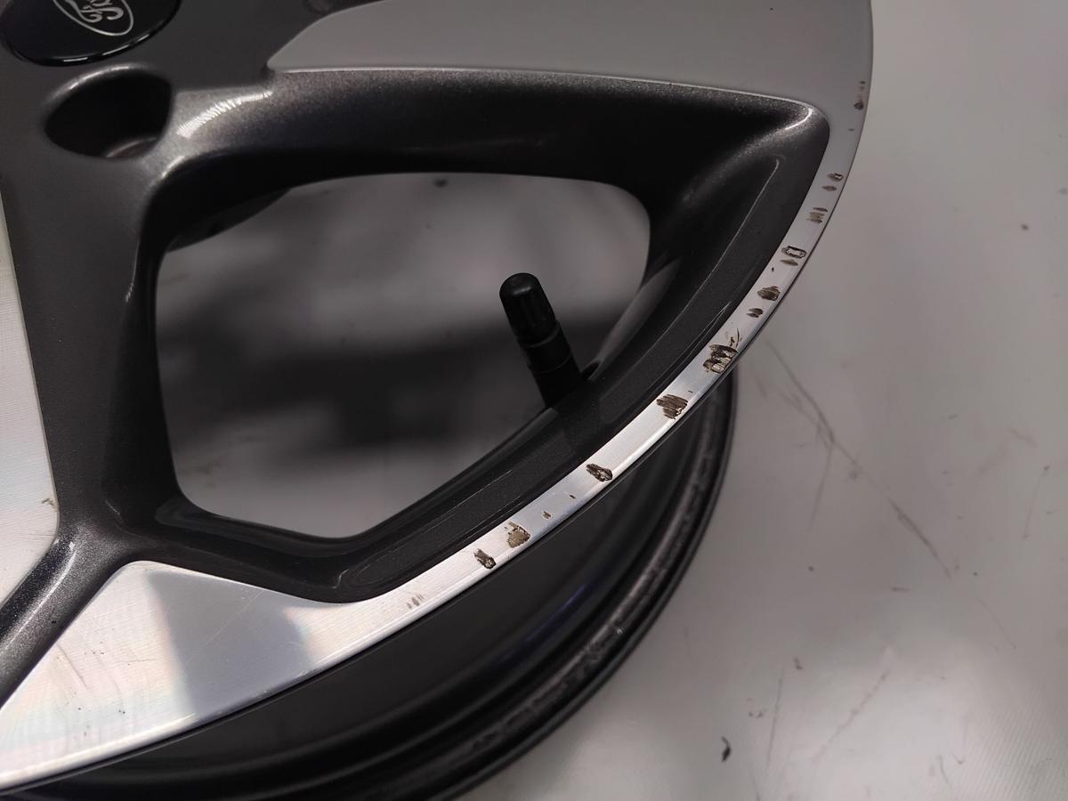 original Alufelge 7.0Jx17H2 ET42.5 J1BC-1007-C1A mit M&auml;ngeln Ford Fiesta HJ HF