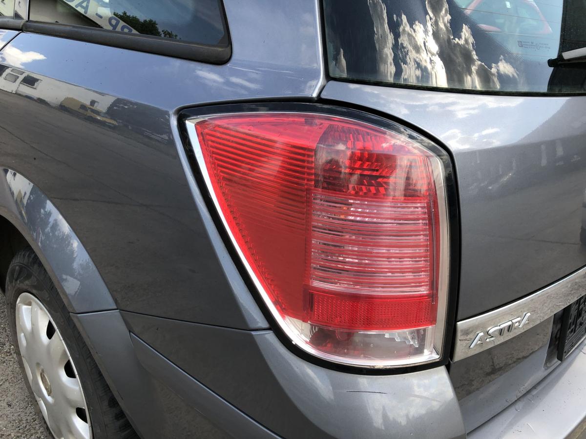 Opel Astra H Caravan R&uuml;ckleuchte links R&uuml;cklicht Heckleuchte Kombi Schlusslicht