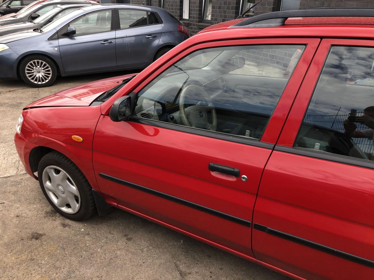 Mazda Demio DW T&uuml;r vorn links Fahrert&uuml;r im Rohbau rot Autot&uuml;r