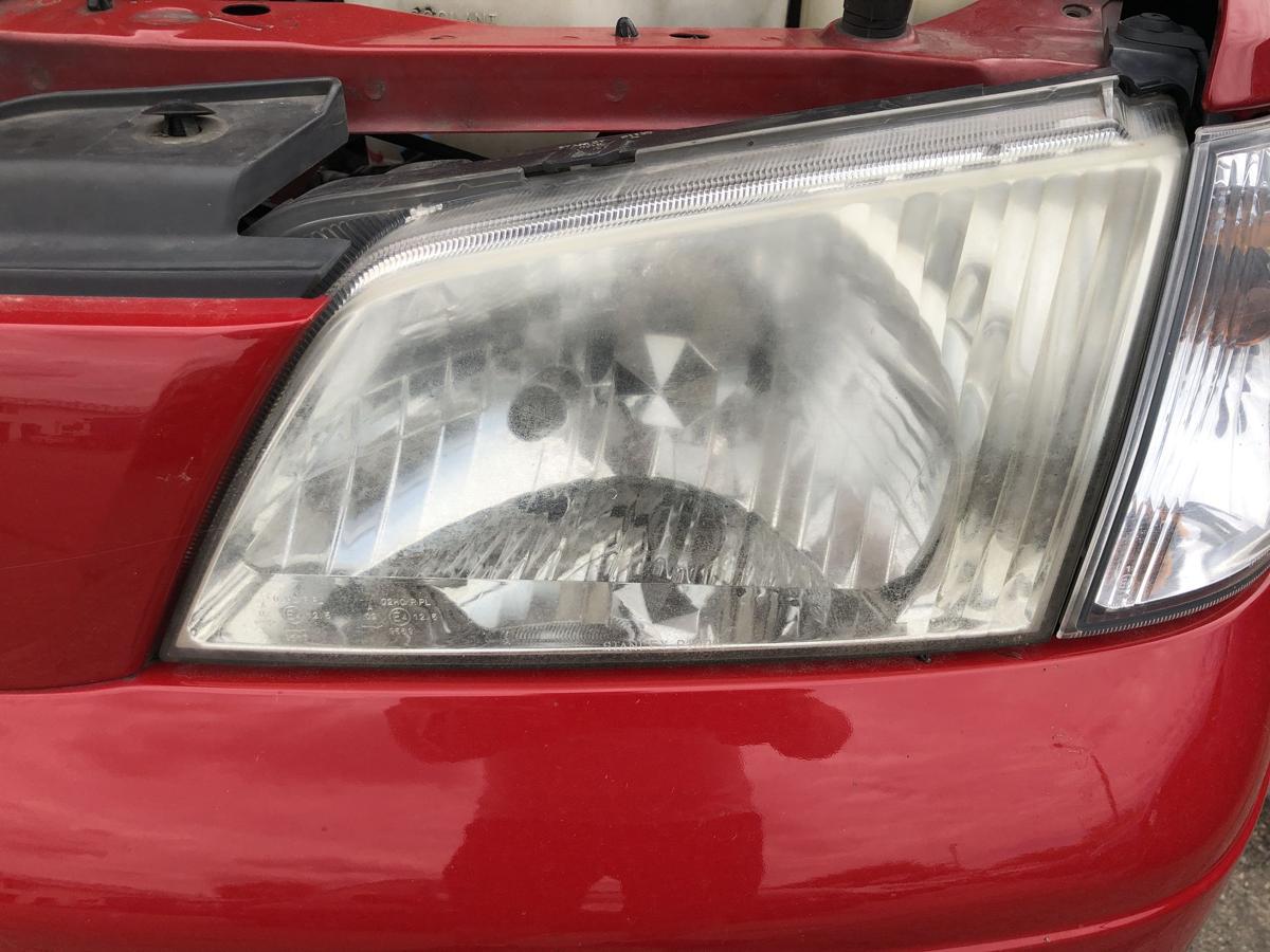 Mazda Demio DW Scheinwerfer links Hauptscheinwerfer Facelift Stanley ab 2000
