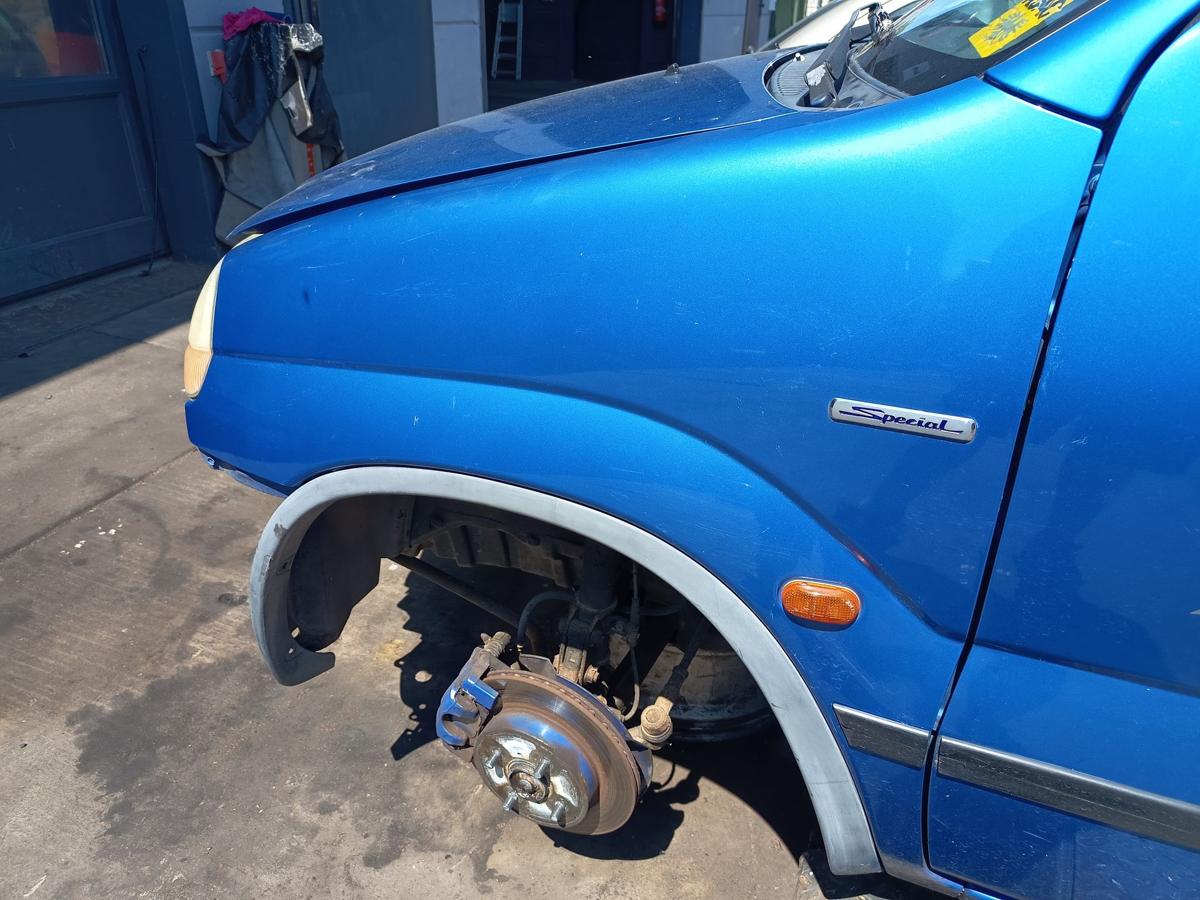 Suzuki Ignis original Kotfl&uuml;gel links Z2J Cyprus Blue Metallic Baujahr 2003
