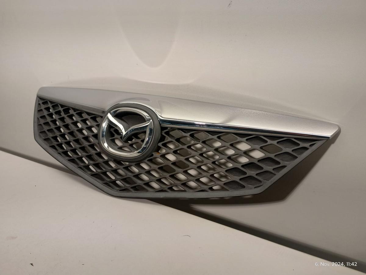 Mazda 2 DY orig Kühlergrill Grill Emblem Facelift ab Bj 2005