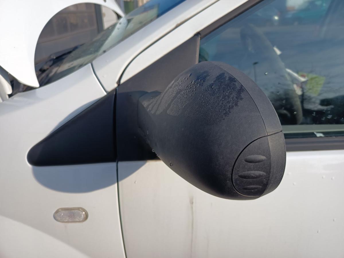 Renault Twingo II original Aussenspiegel links manuell unlackiert Bj 2009