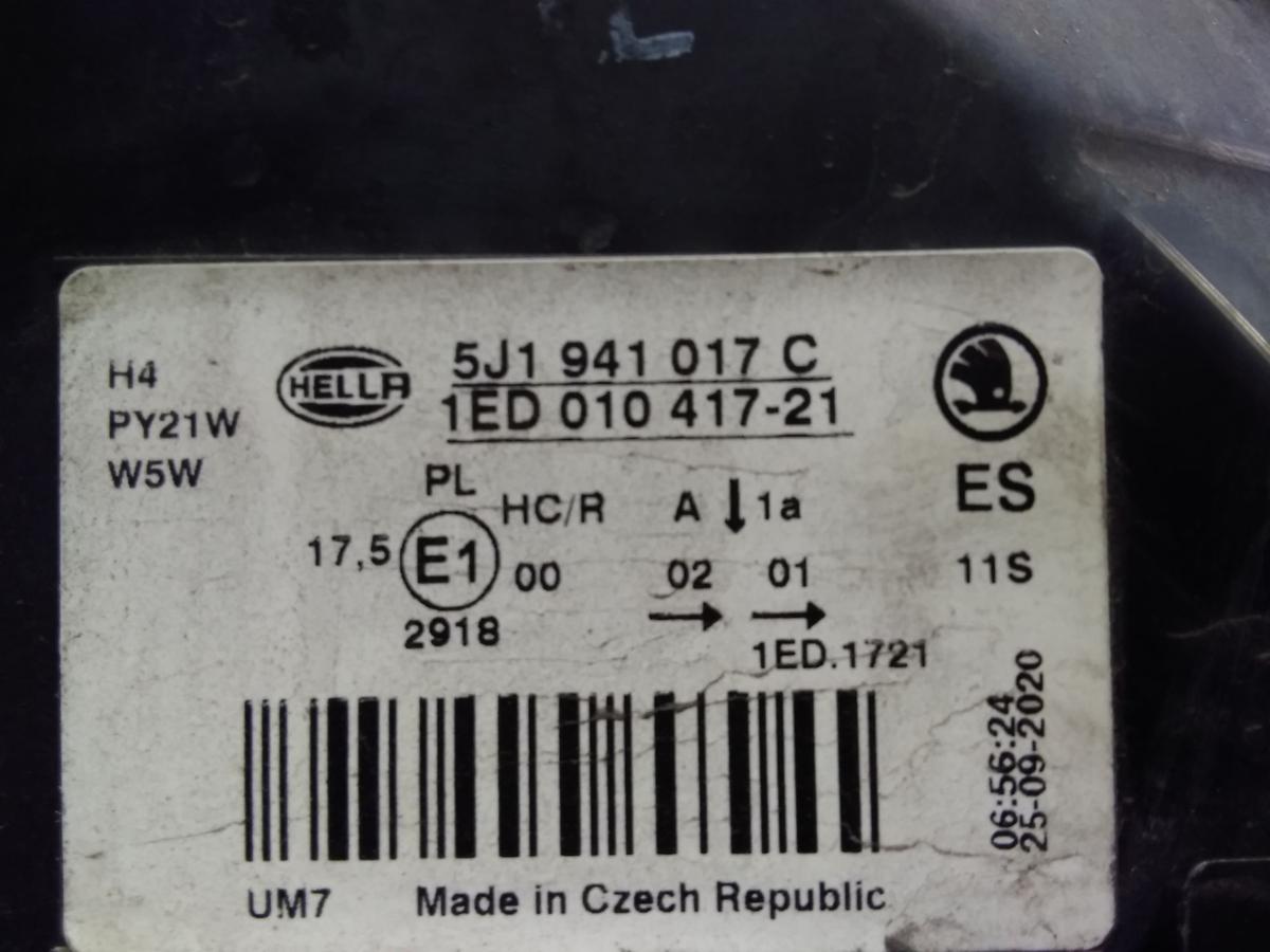 Skoda Fabia 2 5J original Scheinwerfer links H4 Hella mit LWR besch&auml;digt Bj.2010