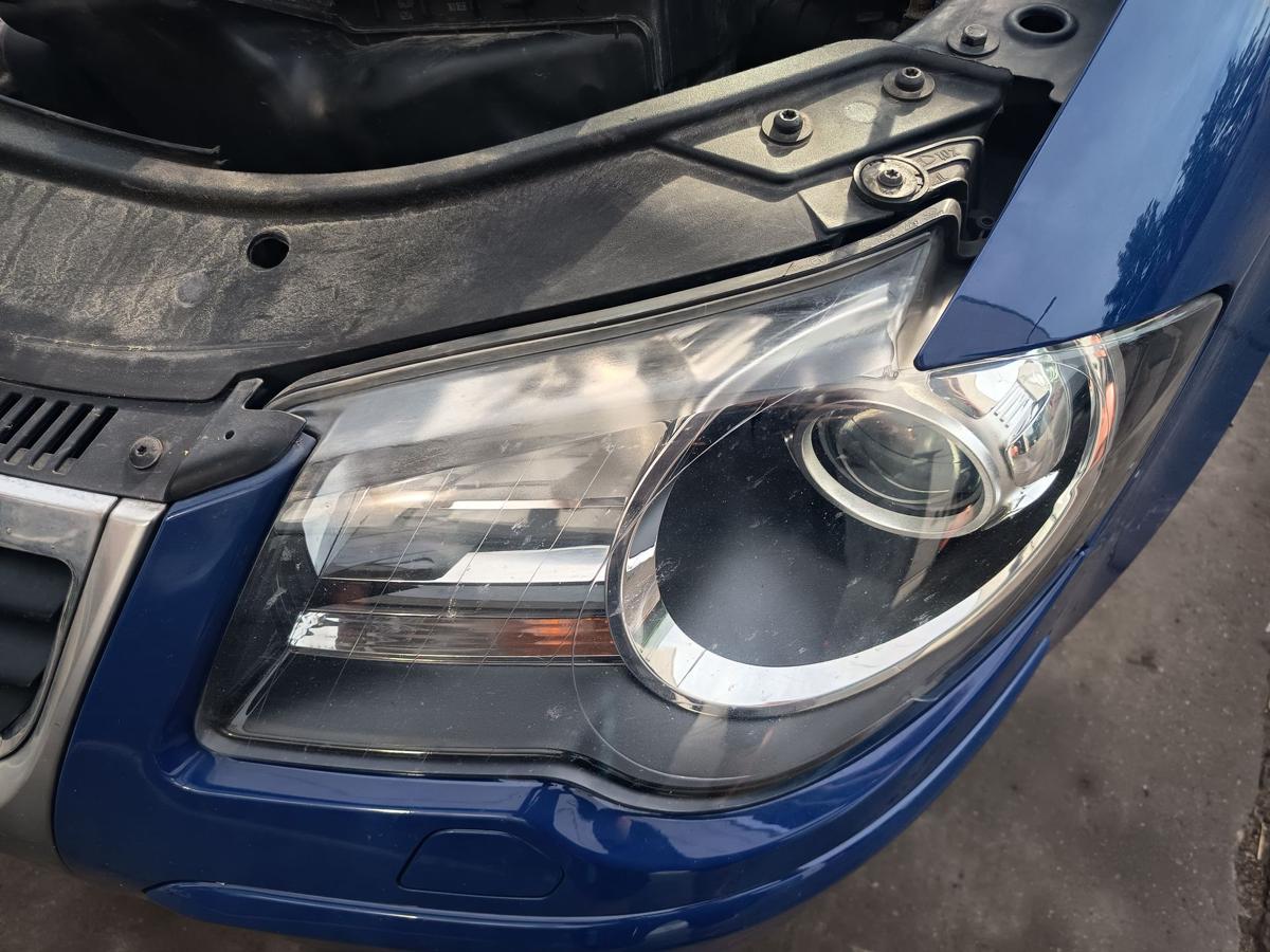VW Touran GP 1T original Hauptscheinwerfer links Halogen Frontlicht Bj 2009