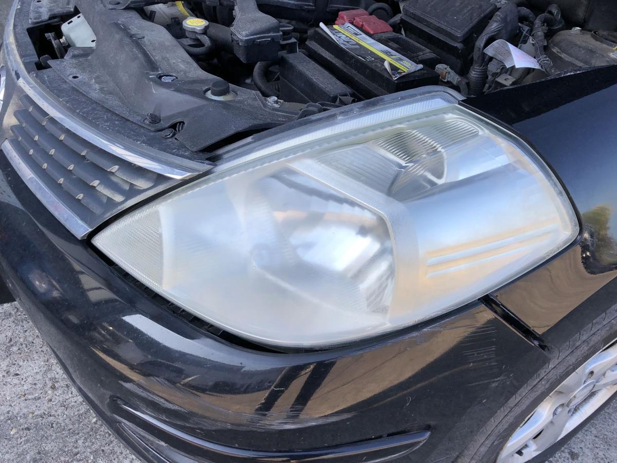 Nissan Tiida C11 Scheinwerfer links Frontscheinwerfer Halogen Lampe