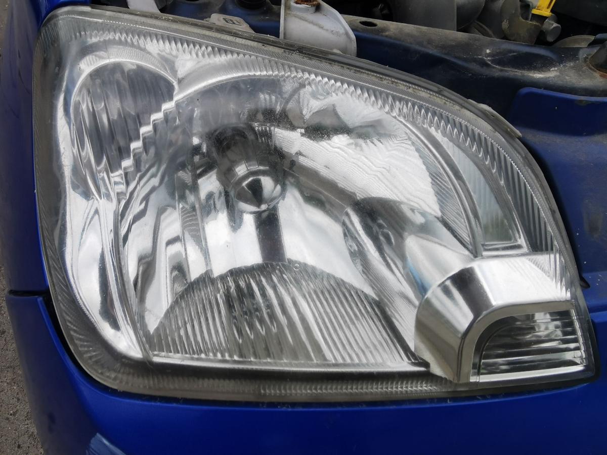 Daihatsu Cuore 251 Scheinwerfer Hauptscheinwerfer Frontscheinwerfer vorn rechts