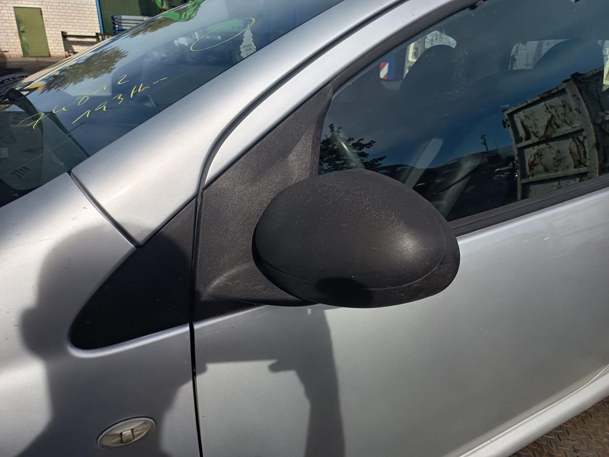 Toyota Aygo I original Aussenspiegel links manuell unlackiert Bj 2009