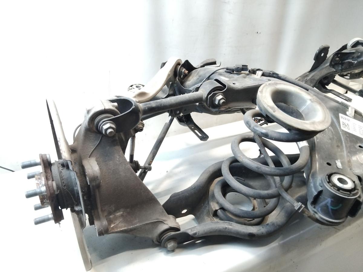 Tesla Model Y RWD original Hinterachse komplett mit Achsschenkeln BJ2023