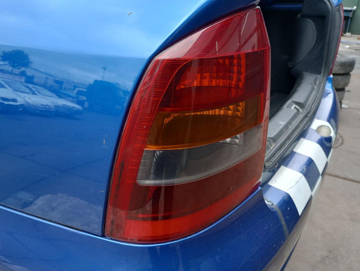 Opel Astra G Coupe orig Rückleuchte links Heck Schluss Licht abgedunkelt Bj 2002