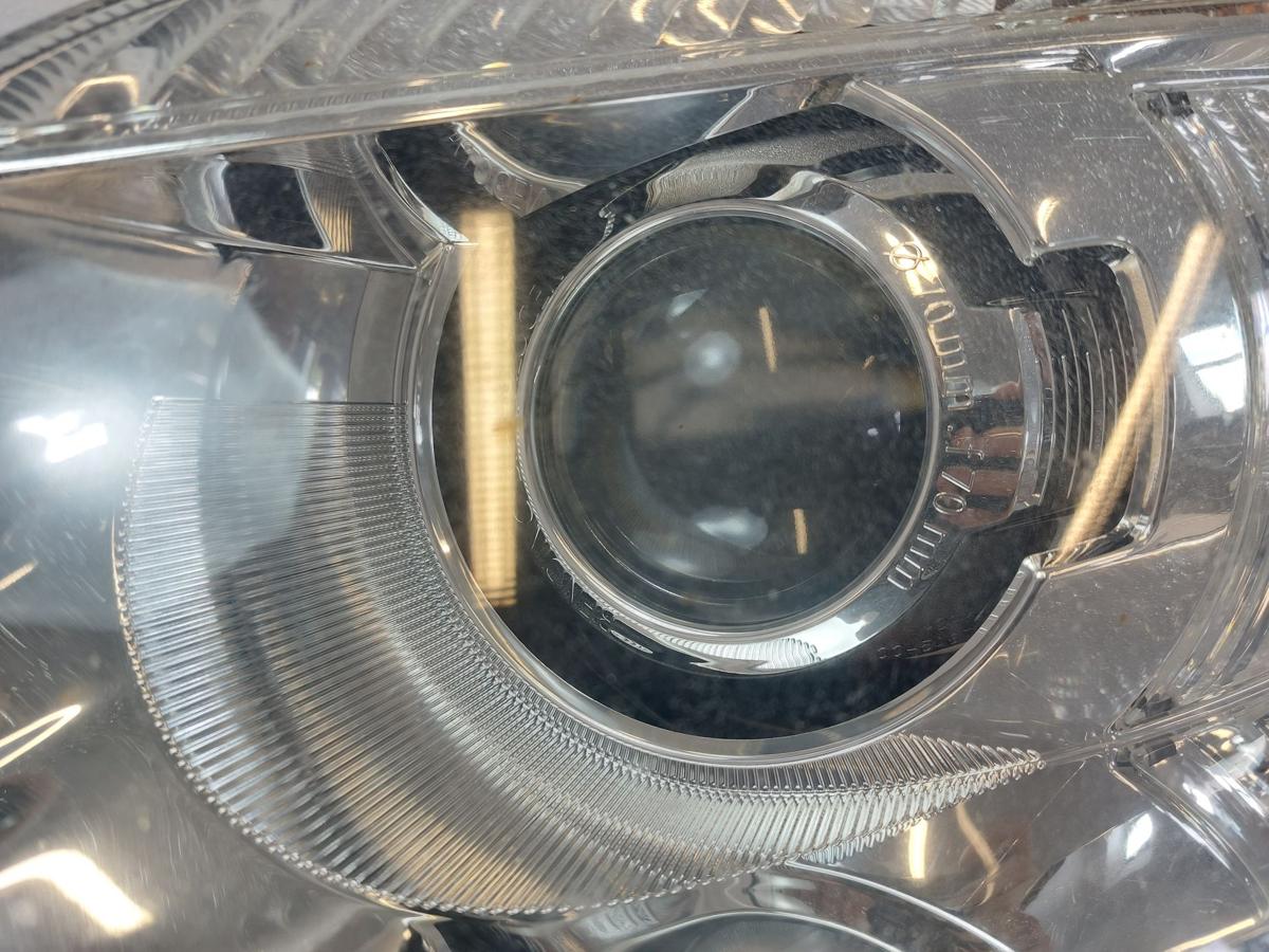 Skoda Fabia 5J Scheinwerfer links Hauptscheinwerfer Bi-Halogen Hella OEM bis 10