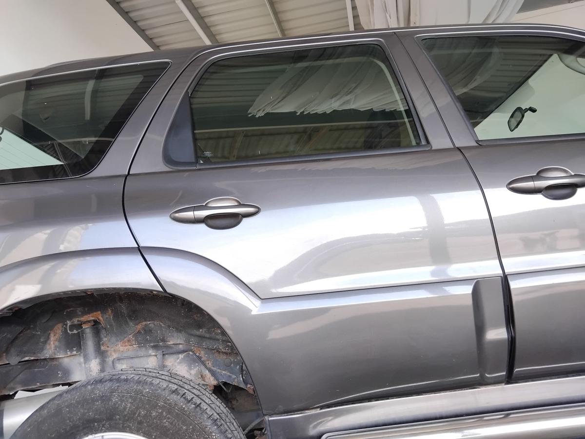 Mazda Tribute EP2 original T&uuml;r hinten rechts graumetallic Anrostung BJ2006