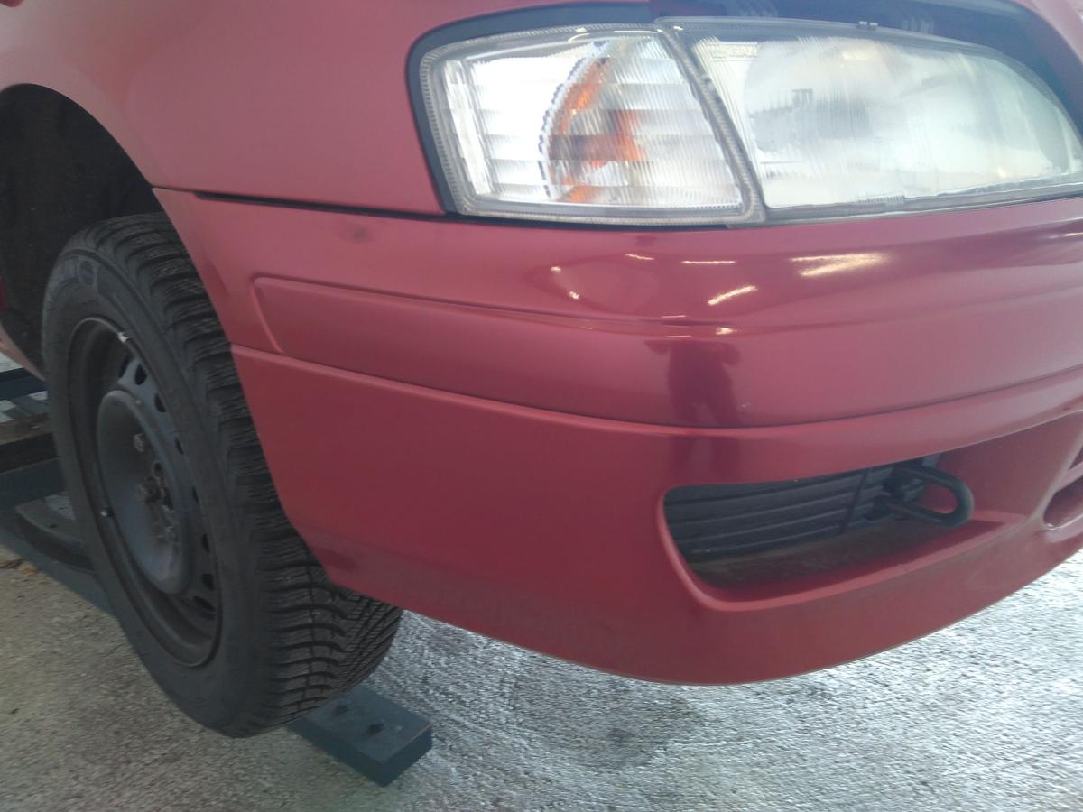 Nissan Primera P11 original Sto&szlig;stange Stossf&auml;nger vorn Rotmetallic AP0 Bj.1998