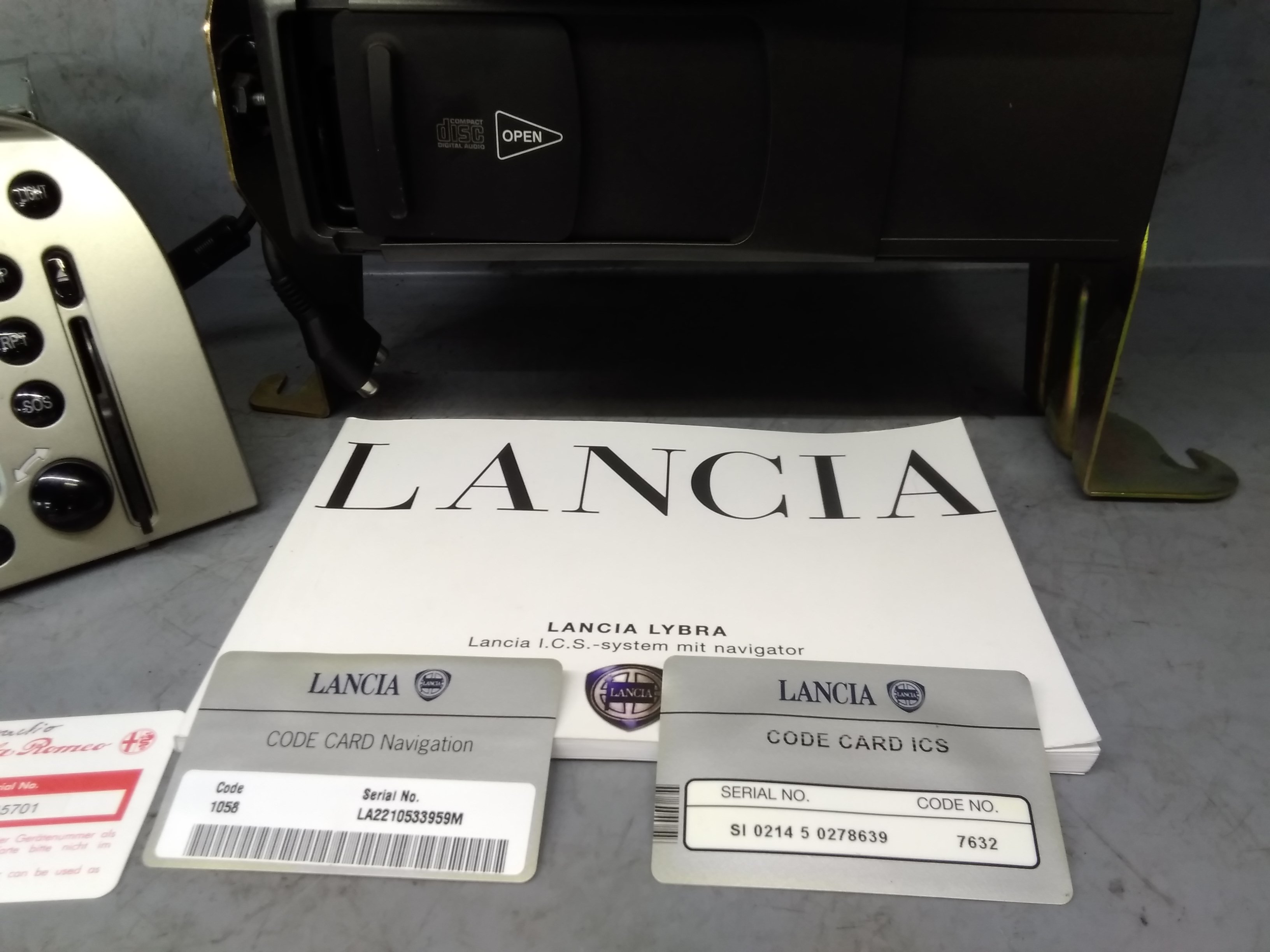 Lancia Lybra orig Navigationssystem mit CD-Wechsler Codekarte Bj 05