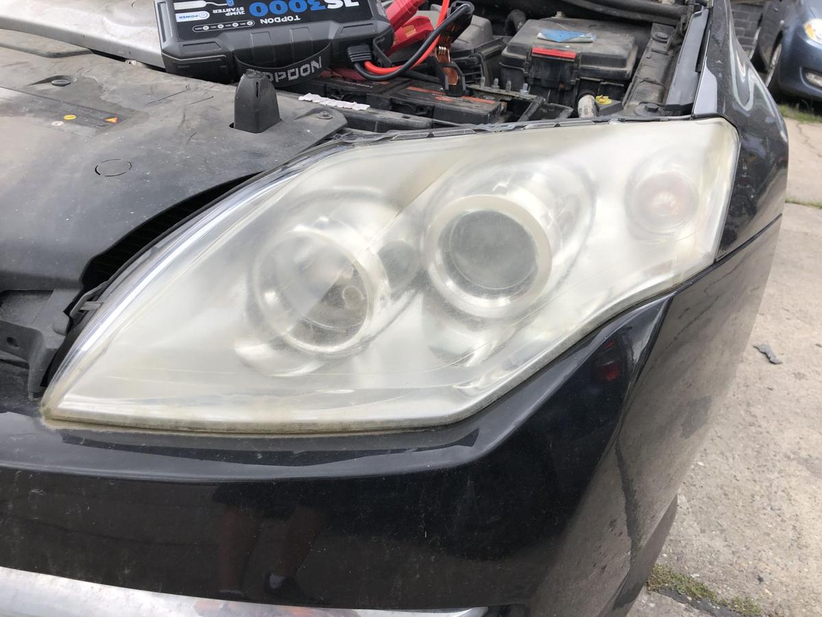 Renault Laguna III 3 Scheinwerfer links Hauptscheinwerfer Halogen stark Tr&uuml;b OE