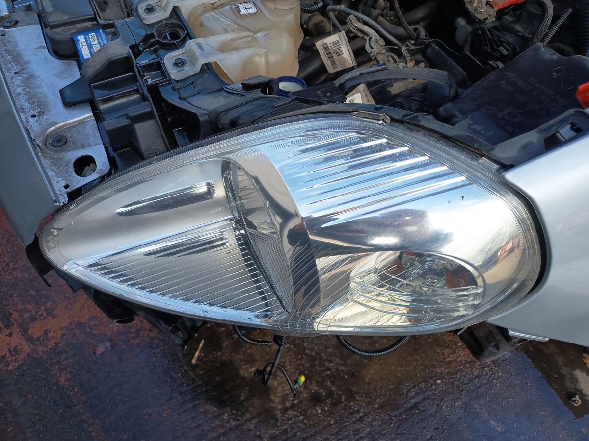 Fiat Grande Punto 199 original Scheinwerfer links Halogen Haupt Front Bj 2009