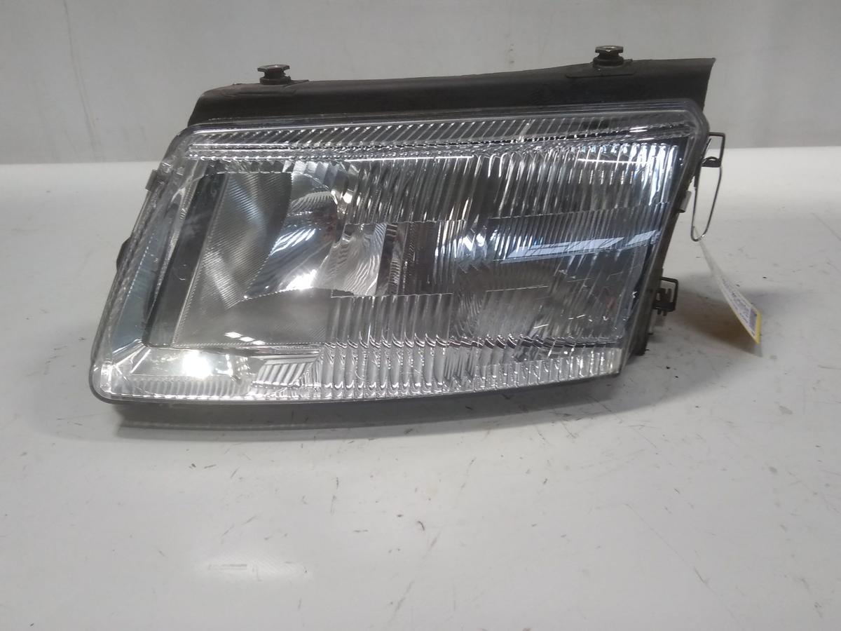 VW Passat 3B original Scheinwerfer links Hella mit LWR H1+H7 Bj.1998