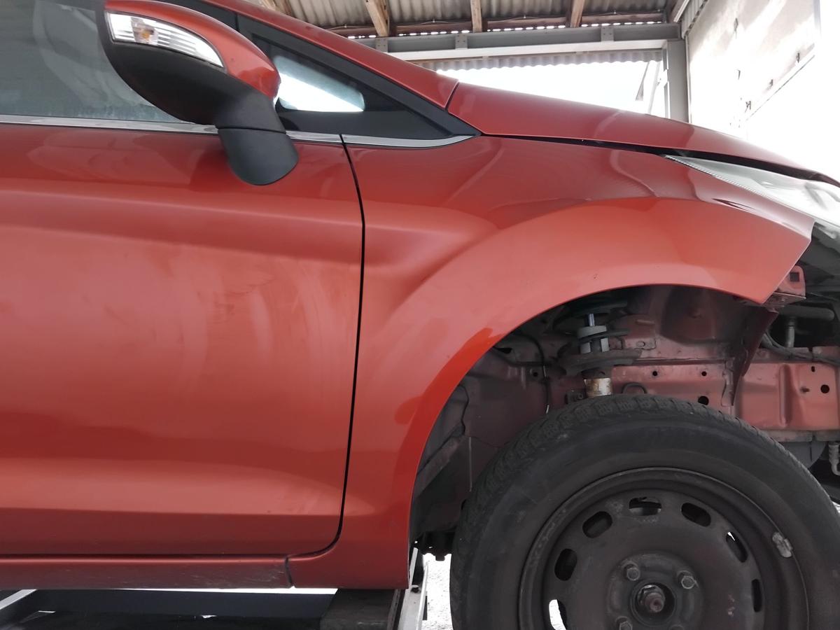 Ford Fiesta JA8 original Kotfl&uuml;gel vorn rechts tangorotmetallic BJ2010