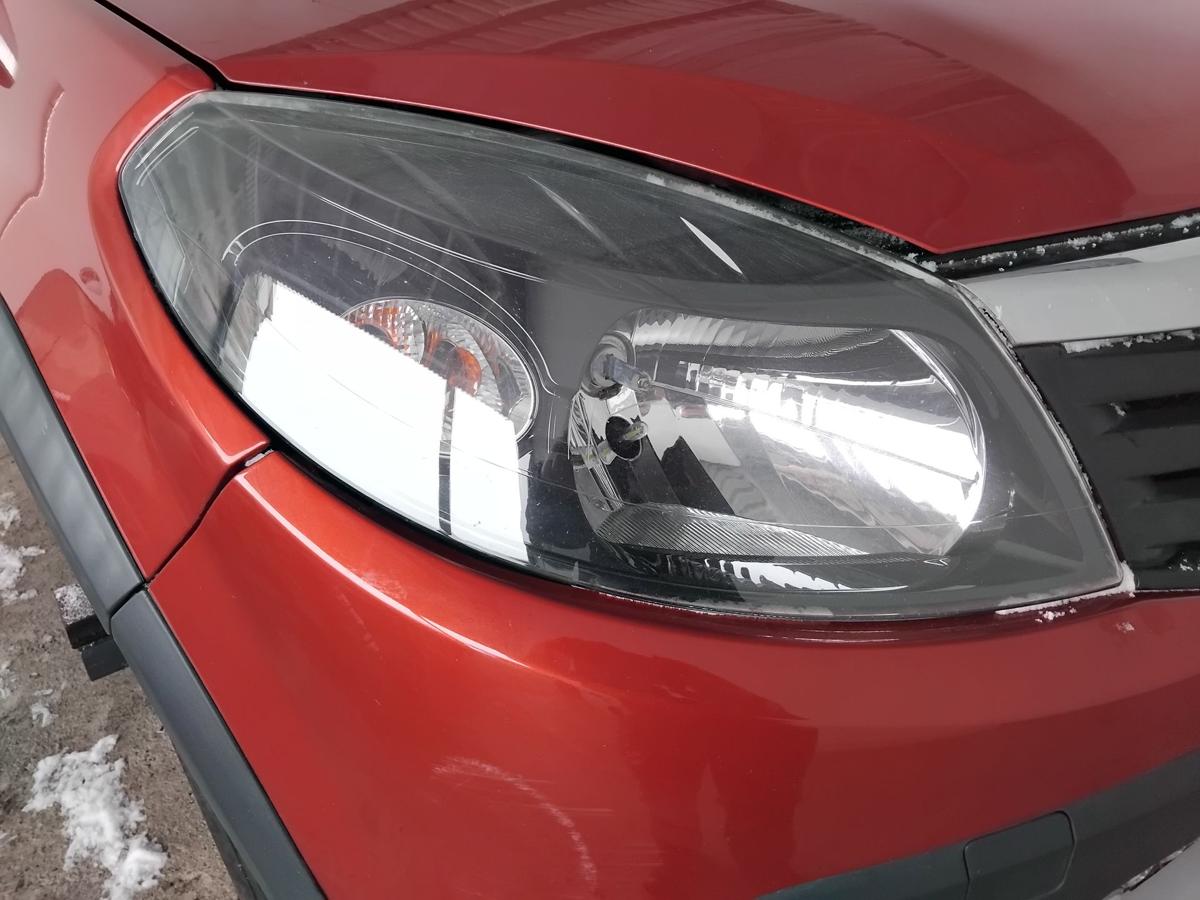 Dacia Sandero 1 orig.Scheinwerfer rechts f&uuml;r Bowdenzug LWR BJ2010 schwarz