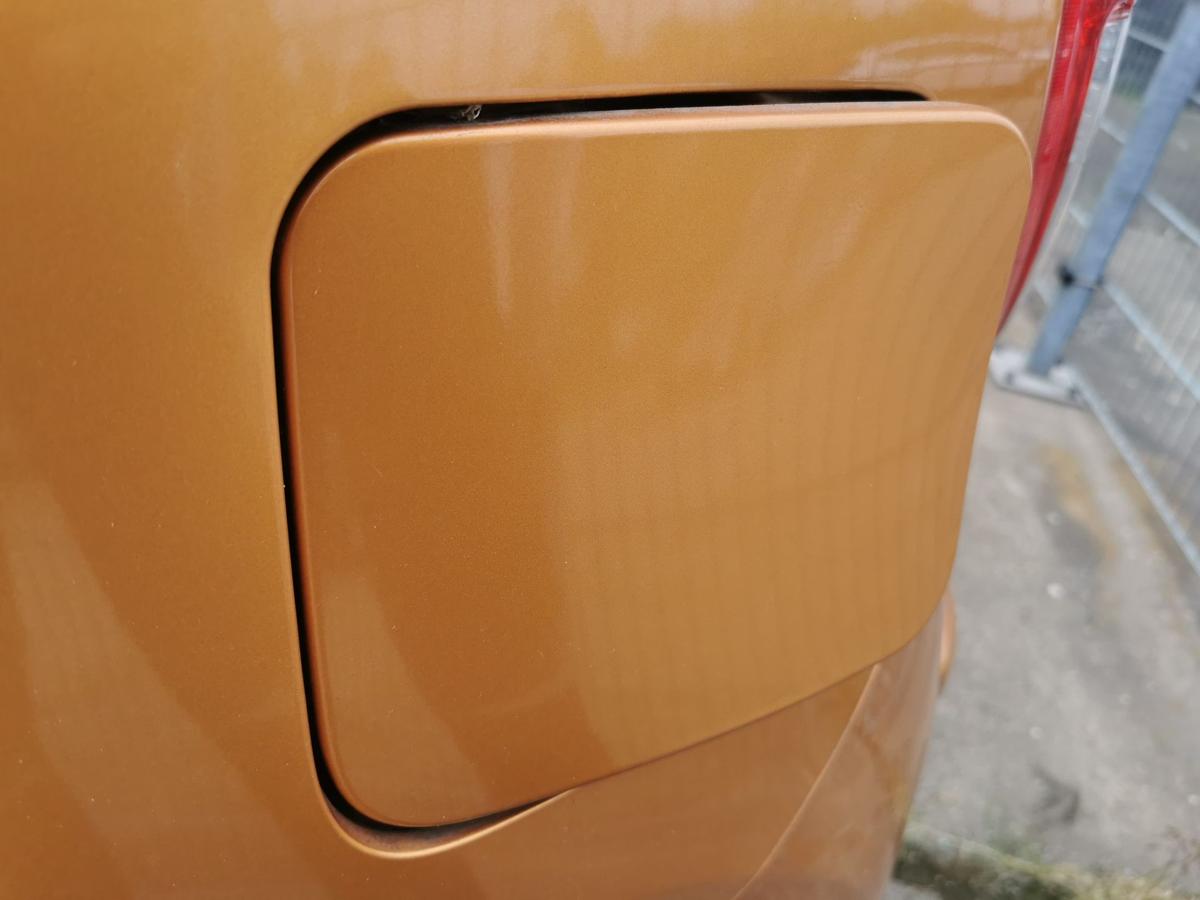 Nissan Micra K13 Tankklappe Tankdeckel Tankverschluss A55 Orange Perl