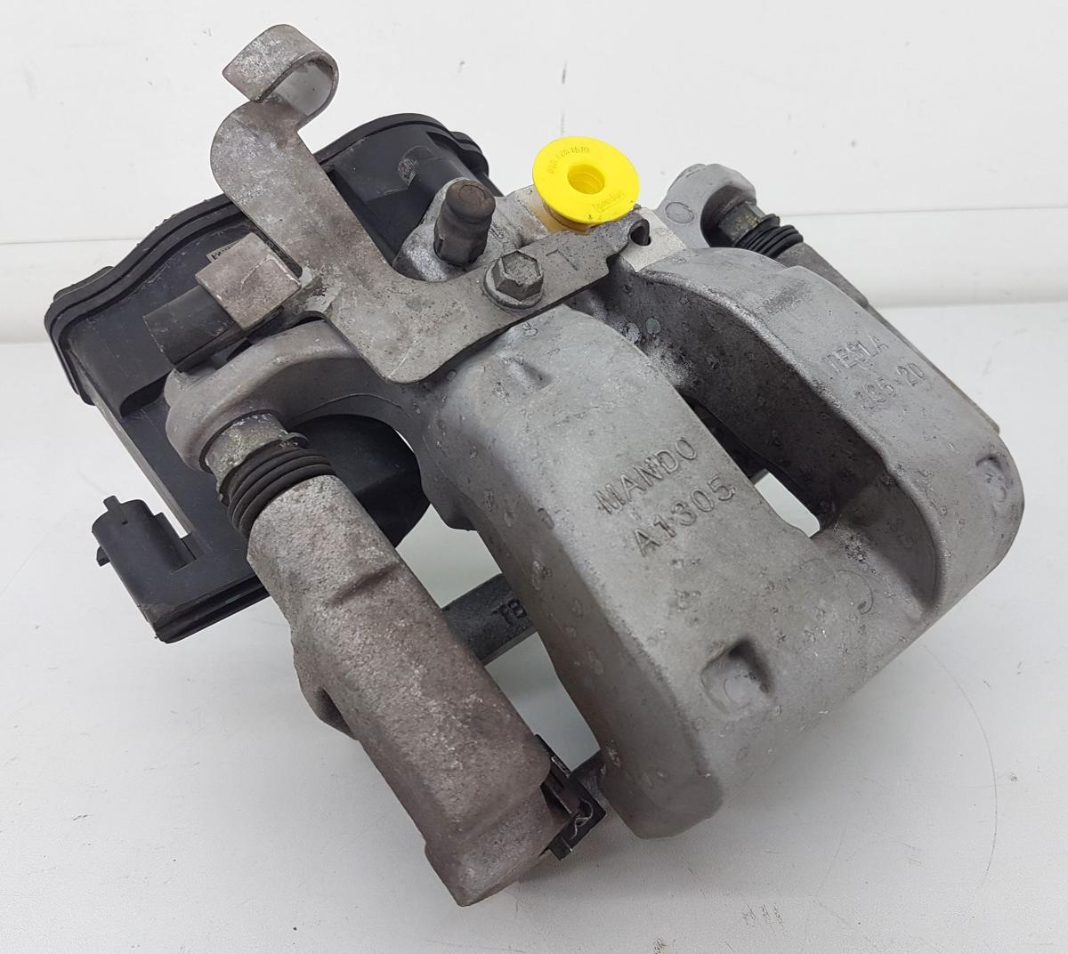 Tesla Model Y Bremssattel hinten links Bj2022 1044627-00-A inkl Tr&auml;ger