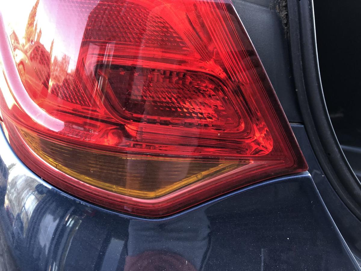 Opel Astra J Rückleuchte links Außenecke Rücklicht Heckleuchte Schlusslicht