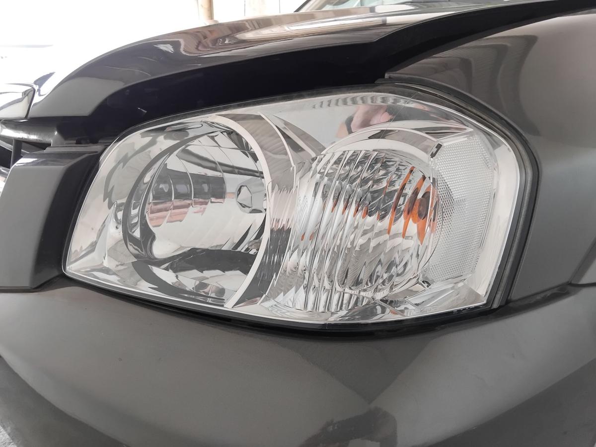 Mazda Tribute EP2 Facelift orig Scheinwerfer links Halogen mit LWR BJ2006 EU Version