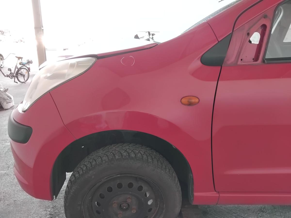 Nissan Pixo original Kotfl&uuml;gel vorn links Z9T Bright Red BJ2010