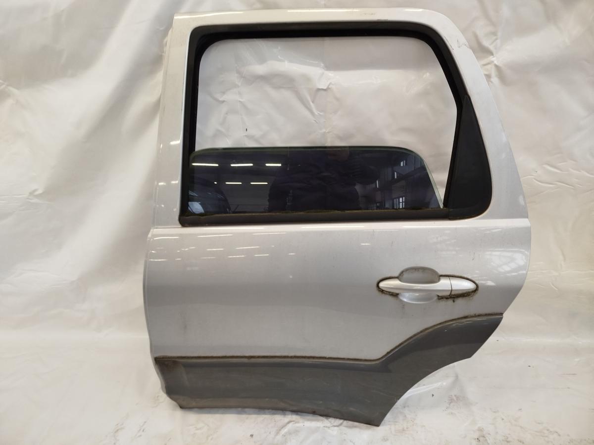 Mazda Tribute EP Tür hinten links Rohbau silbergrau Rost Falz unten 01 bis 04