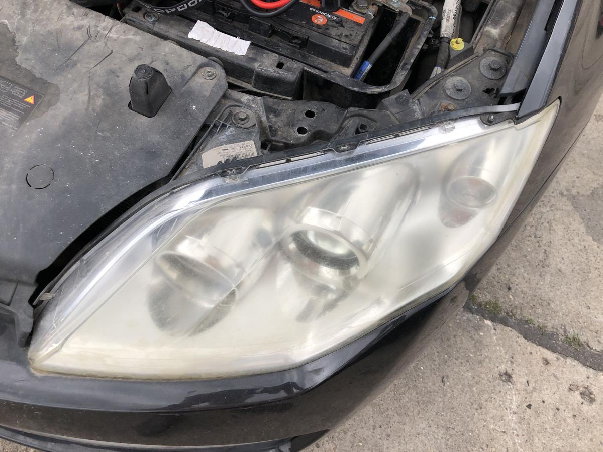 Renault Laguna III 3 Scheinwerfer links Hauptscheinwerfer Halogen stark Tr&uuml;b OE