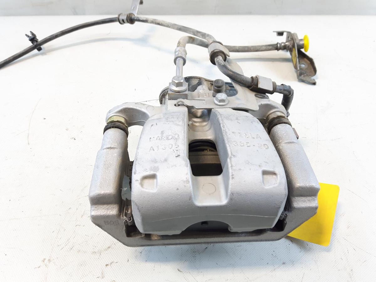 Tesla Model Y original Bremssattel Hinterachse rechts Mando 104462800A Bj2023