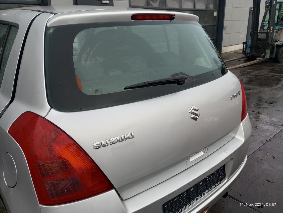 Suzuki Swift MZ EZ orig Heckklappe mit Scheibe Kofferraum ZCC Silber Bj 2005