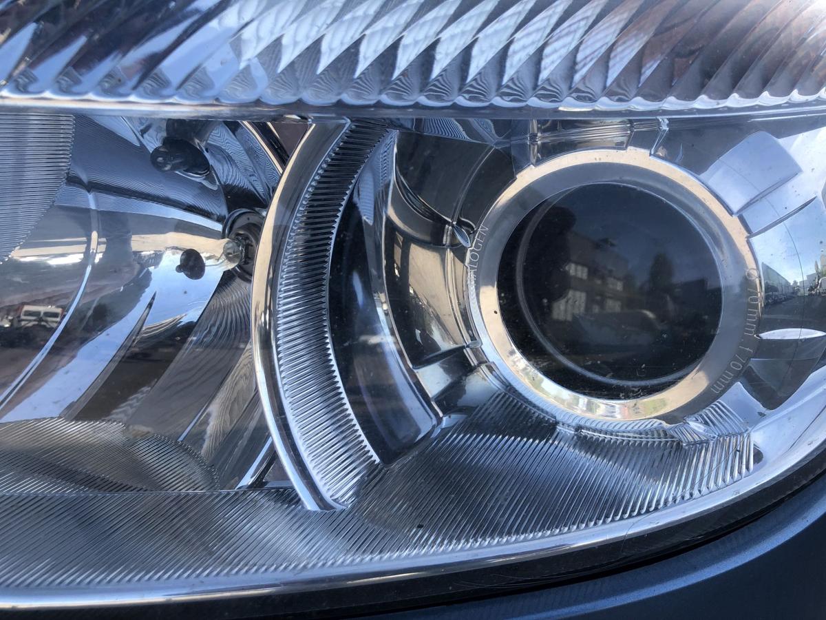 Skoda Fabia II 2 5J Scheinwerfer links Halogen Linse ab 2010 ohne Kurvenlicht