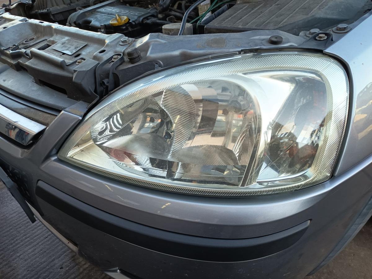 Opel Corsa C original Scheinwerfer links Halogen Haupt Licht Front Bj 2004