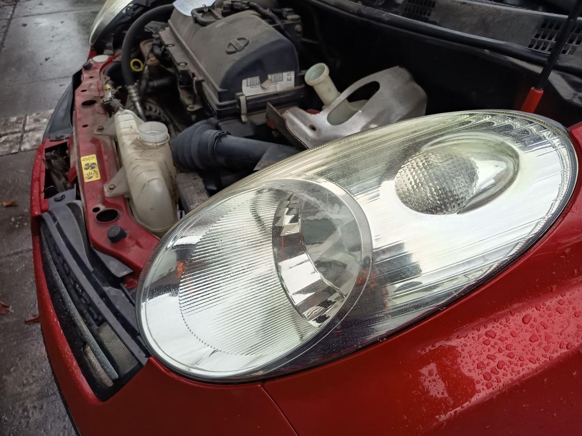 Nissan Micra K12 original Scheinwerfer links Halogen/Haupt/Licht/Front Bj 2005