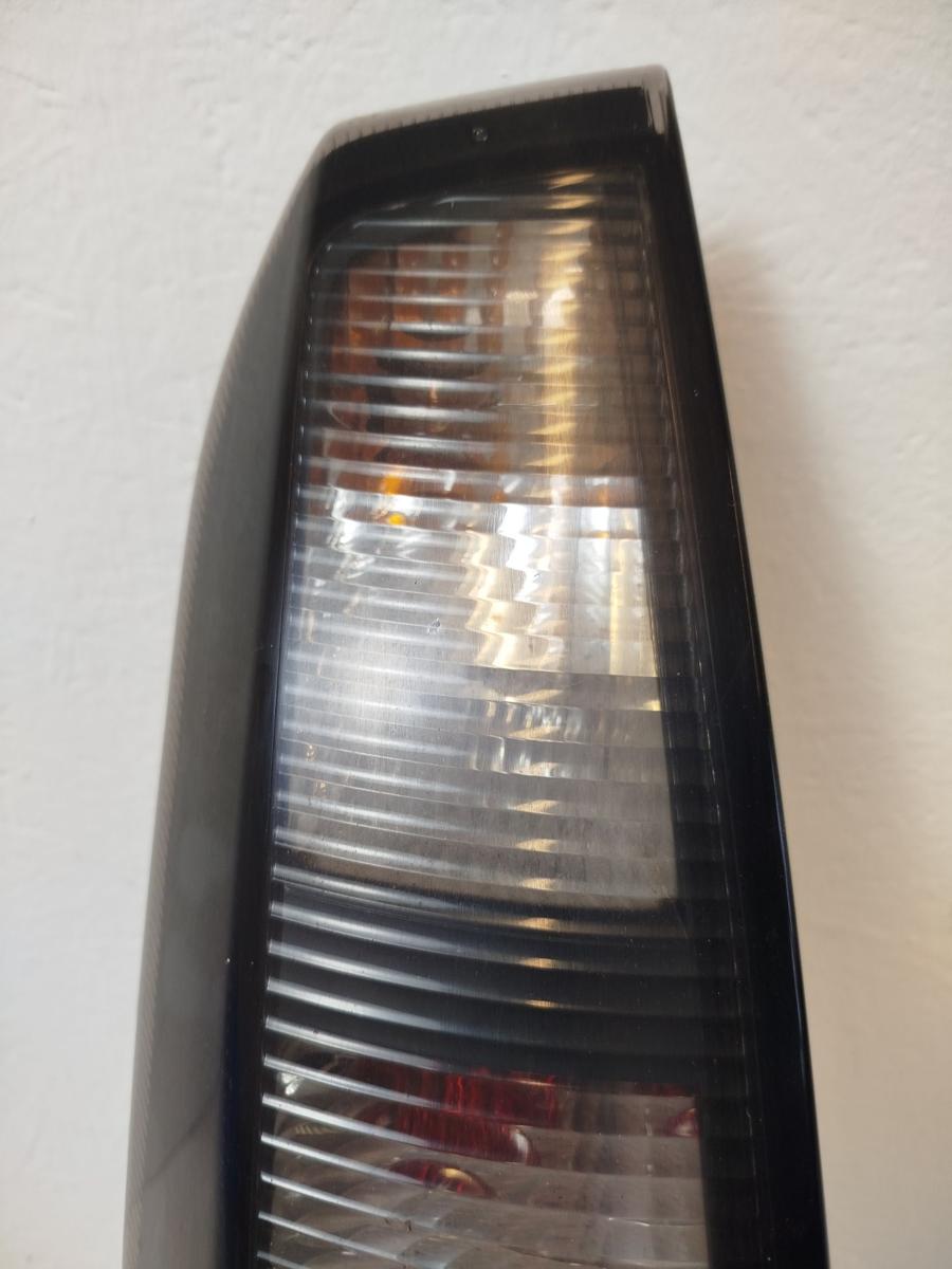 Opel Meriva A Rückleuchte Schlussleuchte Rücklicht Lampe hinten links schwarz