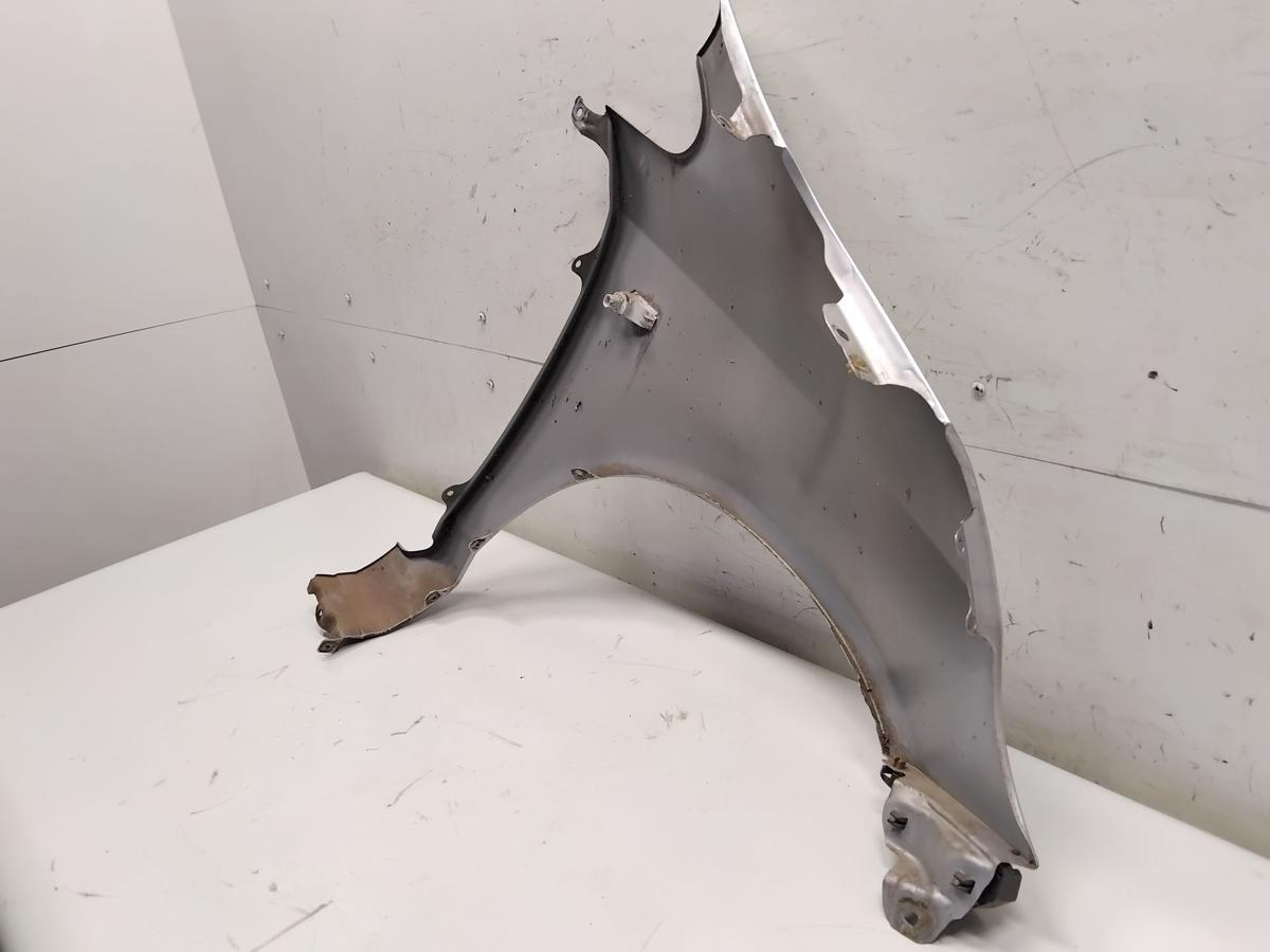 Honda Jazz GD original Kotfl&uuml;gel vorn links silber NH623M Bj.2003