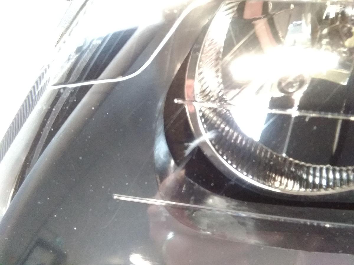 Renault Clio 2 Scheinwerfer links TYC grauer Hintergrund Facelift Halogen BJ2003