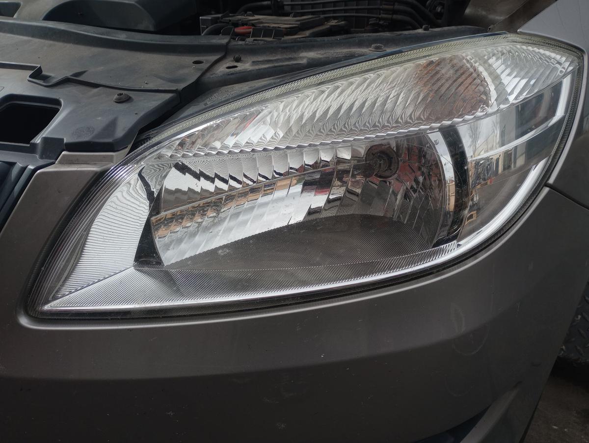 Skoda Fabia II Kombi orig Scheinwerfer links Halogen Facelift Bj 2010