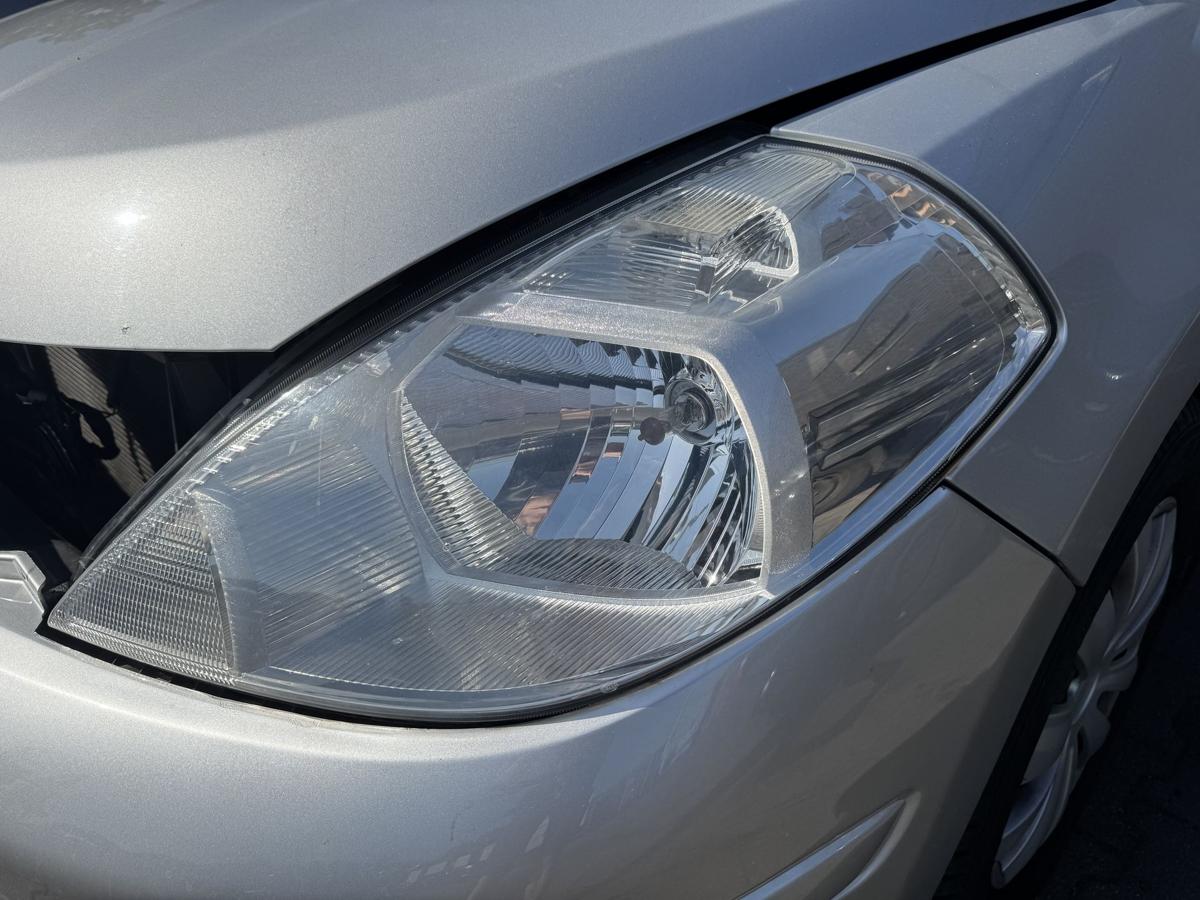 Nissan Tiida original Scheinwerfer vorn links Halogen Bj.2009