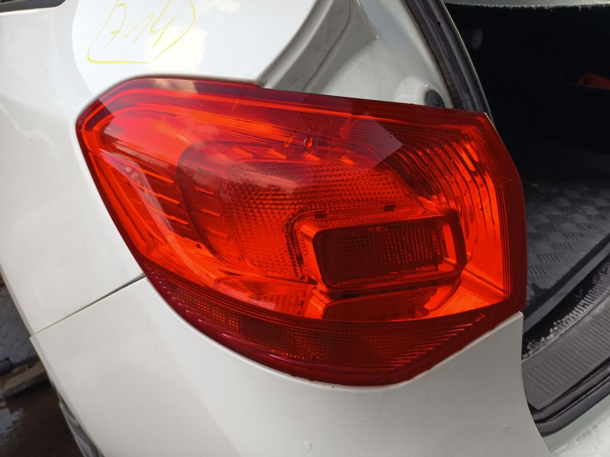 Opel Astra J Sports Tourer original R&uuml;ckleuchte links aussen Heck Licht Bj 2013