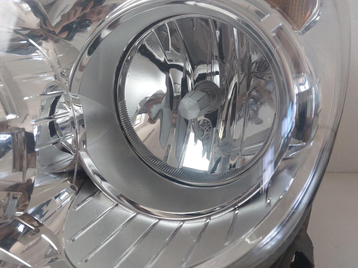 Opel Astra H Scheinwerfer links Hauptscheinwerfer Halogen OEM Hella Chrom 04-10