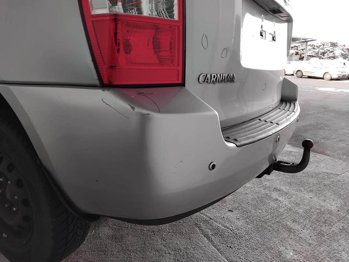 Kia Carnival III MB original Stossfänger Stoßstange hinten PDC BJ2007 silber