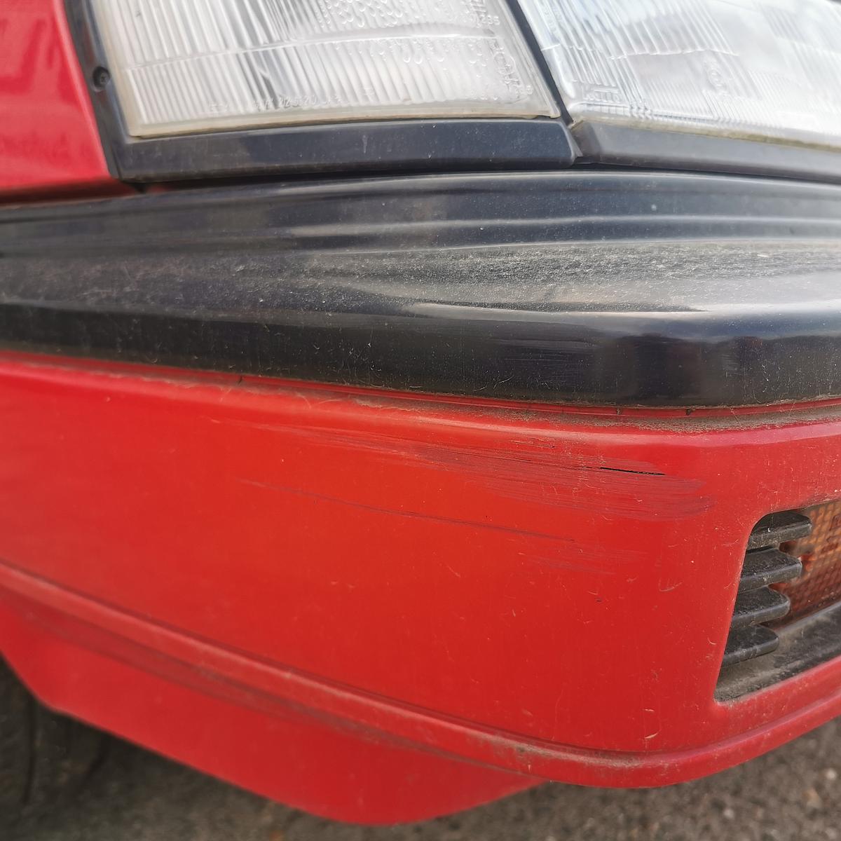 Nissan Sunny Coupe B12 Stoßstange Stoßfänger Bumper vorn 526 Hot Red Uni